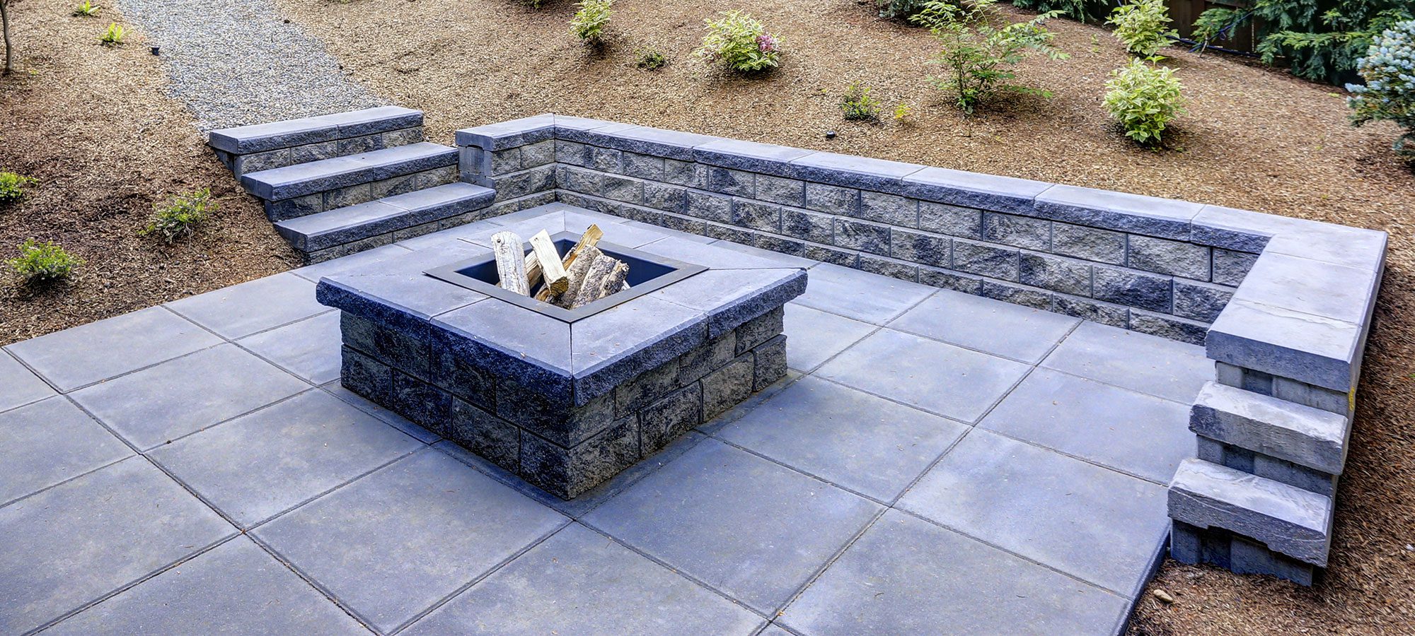 concrete fire pit backyard